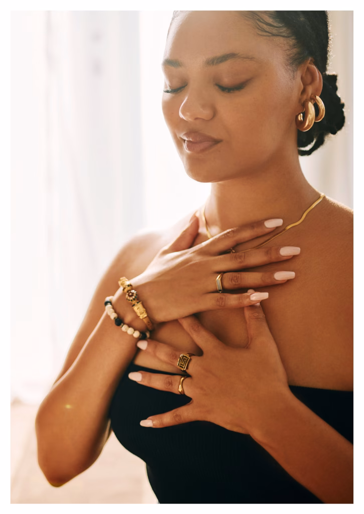 Women meditating together during The Manifestation Journey special event