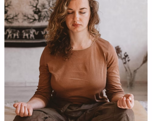 Women meditating together during The Manifestation Journey workshop